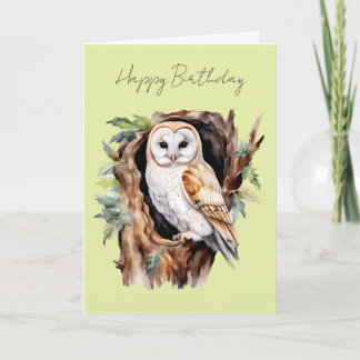 Une carte d'anniversaire de hibou par un trou dans