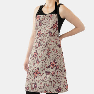 Une personne porte un tablier à motif floral