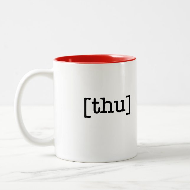 Une tasse une tasse de jeudi de jour (Gauche)