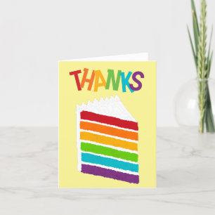 Une tranche de gâteau arc-en-ciel Merci