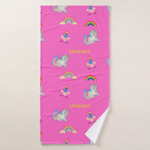 Unicorn pattern on pink bath towel
