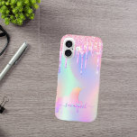 Unicorn pink drips holographic name iPhone 16 case<br><div class="desc">A trendy iridescent background with unicorn and rainbow pastel colours in pink, purple, mint green. Decorated with faux glitter drips in pink, purple and a rainbow coloured unicorn. Purple coloured letters. Personalize and add your name. The name is written with a modern hand lettered style script with swashes. To keep...</div>