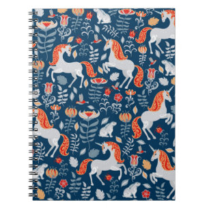 Unicorns,rabbits,birds,flowers on a blue backgroun notebook