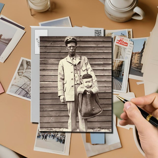 Uniformed Postman with Baby in Mailbag Postcard (Creator Uploaded)