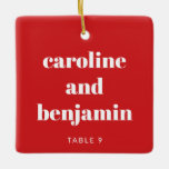 Unique Custom Place Card Christmas Wedding Red Ceramic Ornament<br><div class="desc">Make your winter wedding extra special with this unique custom ceramic ornament in red and white, doubling as a personalized place card for your guests. Featuring their name in elegant typography, it serves as a thoughtful escort card and a keepsake they can treasure. Perfect for a Christmas wedding, this festive...</div>