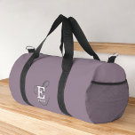 Unique Stylish Name and Monogram Typography Purple Duffle Bag<br><div class="desc">A beautiful duffle bag design with an elegant stylish representation of your name and monogram with classic serifs and a more ornate script typography in a balanced and symmetrical harmony. The three elements blend together with a sophisticated harmony and create your own personal branding logo. Shown here with a trendy...</div>