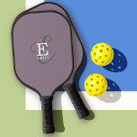 Unique Stylish Name and Monogram Typography Purple Pickleball Paddle<br><div class="desc">It's all about you with this beautiful pickleball paddle design. It has an elegant stylish representation of your name and monogram with classic serifs and a more ornate script typography in a balanced symmetry. The three elements blend together with a sophisticated harmony and create your own personal branding logo. Shown...</div>