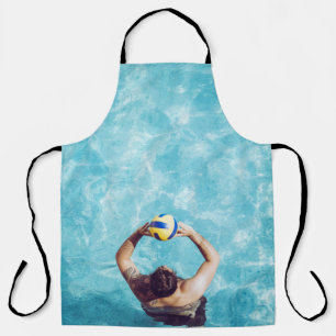 Unknown person playing beach volleyball apron