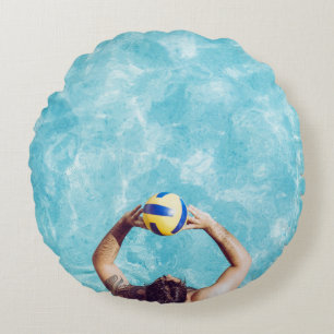 Unknown person playing beach volleyball round pillow
