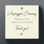 Unplugged Wedding Ceremony Fancy Calligraphy Plaqu Plaque<br><div class="desc">This is a minimalist style specialty message for your unplugged wedding ceremony to make sure your guests are fully present on your special day. And to make sure your photographer can do their job unhindered. Done in two classy fonts this is a fancy calligraphy style with a flower and heart...</div>