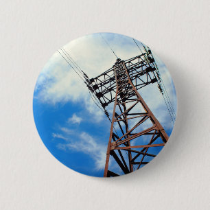 Upward view diagonally to the power line and pylon 2 inch round button