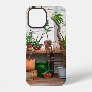 Urban jungle. Winter garden with plants, flowers. iPhone 12 Case