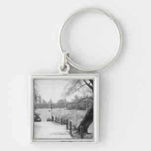 Urban park with tranquil lake keychain