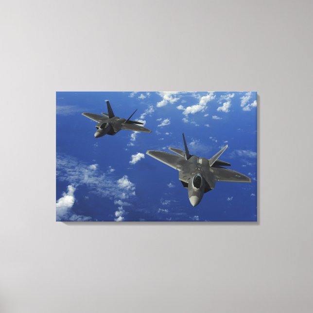US Air Force F-22 Raptors in flight near Guam Canvas Print (Front)