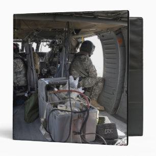 US Army soldiers watch for hazards Binder