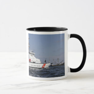 US Coast Guard Cutter Marlin patrols the waters Mug