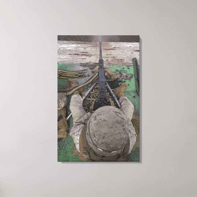 US Marine fires an M2 50-calibre machine gun Canvas Print (Front)