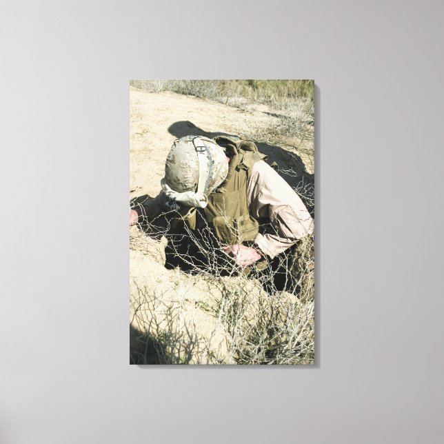 US Marine jumps down a hole Canvas Print (Front)