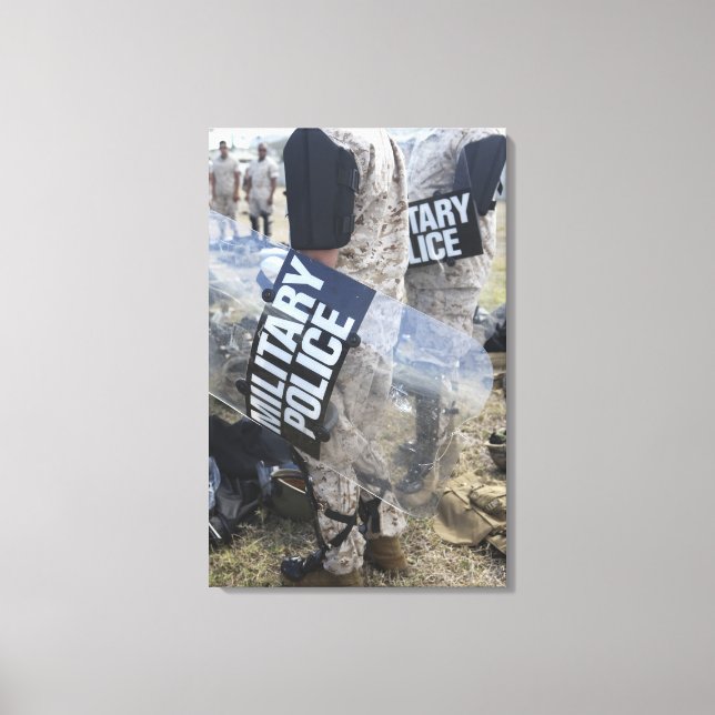 US Marines and Sailors don riot gear Canvas Print (Front)