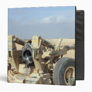 US Marines prepare to fire a howitzer 2 Binder