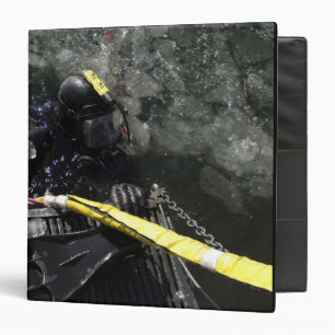 US Navy Diver gets ready to start his dive Binder