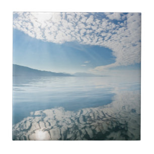 USA, Alaska, Freshwater Bay. Clouds Reflected Tile