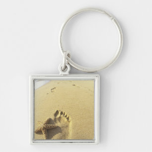 USA, Hawaii, Maui, Makena Beach, Footprint and Keychain