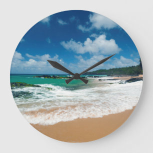 USA, Kauai, Hawaii. A Woman Strolls The Rocks Large Clock
