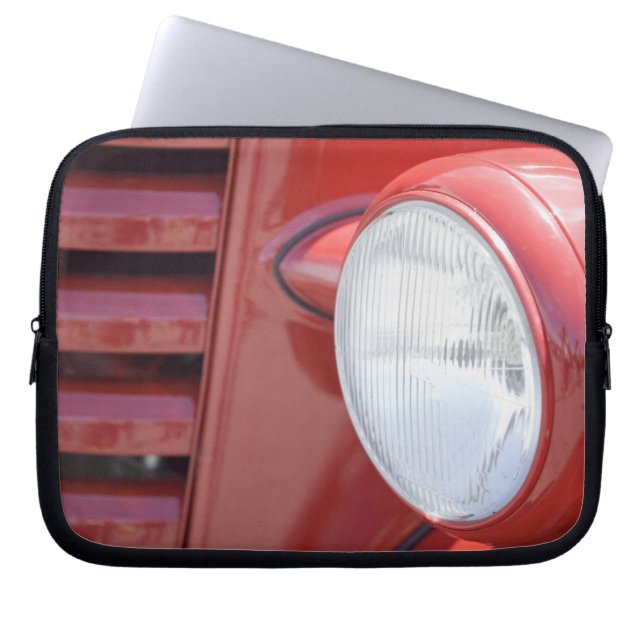 USA, Maine, Owl's Head. Headlight and partial Laptop Sleeve (Front)
