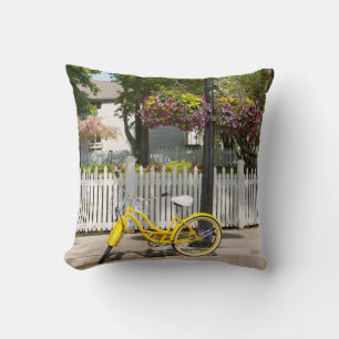 USA, Michigan, Mackinac Island. Yellow Bike Throw Pillow