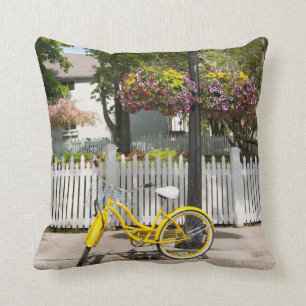 USA, Michigan, Mackinac Island. Yellow Bike Throw Pillow
