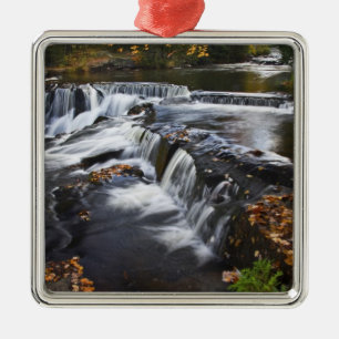 USA, Michigan, Upper Peninsula. Bond Falls and Metal Ornament