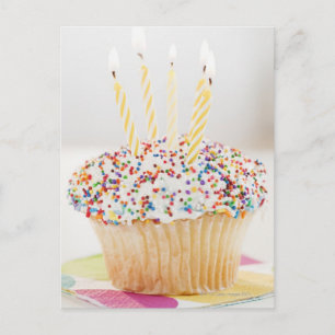 USA, New Jersey, Jersey City, Cupcake with Postcard