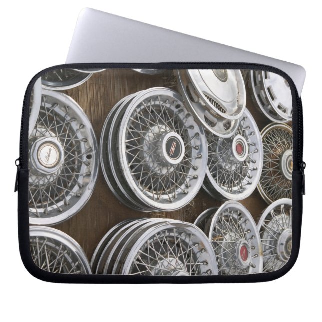 USA, New Mexico, Prewitt: Auto Hubcaps / Rt. 66 Laptop Sleeve (Front)