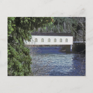 USA, Oregon. A pick-up crossing the Postcard