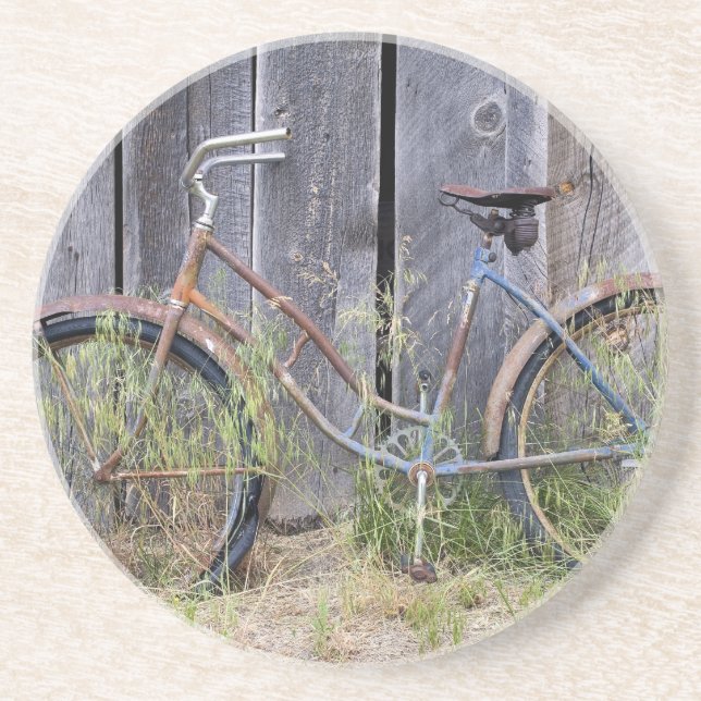 USA, Oregon, Bend. A dilapidated old bike Coaster (Front)