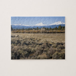 USA, Oregon, Field with snow covered Cascade Jigsaw Puzzle