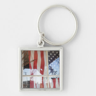 USA, Oregon, Shaniko. Flag in window next to Keychain