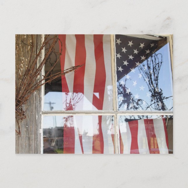 USA, Oregon, Shaniko. Flag in window next to Postcard (Front)