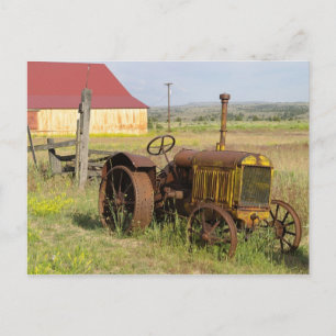 USA, Oregon, Shaniko. Rusty vintage tractor in Postcard