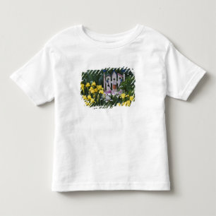 USA, Pennsylvania. Garden irises grow around Toddler T-shirt