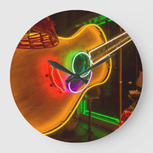 USA, Texas, Austin. Neon Guitar At Blackmail Large Clock