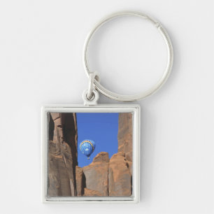 USA, Utah, Monument Valley. A rainbow hot-air Keychain