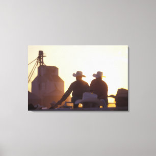 USA, Wyoming, Pine Bluffs. Two men shake Canvas Print