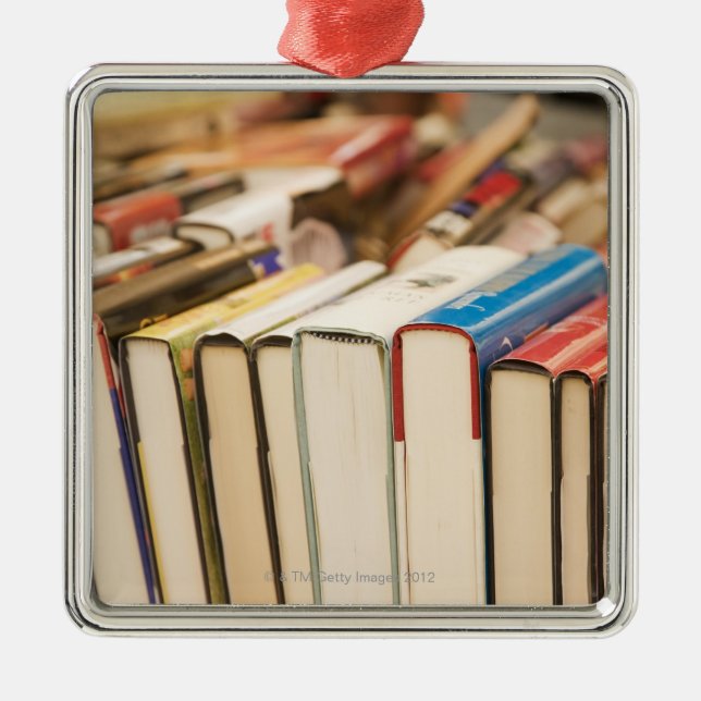 Used books at a rummage sale metal ornament (Front)