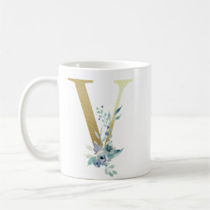 V golden initial with blue floral foliage coffee mug