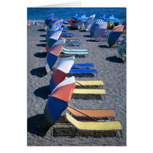Vacant Chairs On Beach