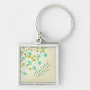 Vaccinated notification with teal flowered keychain