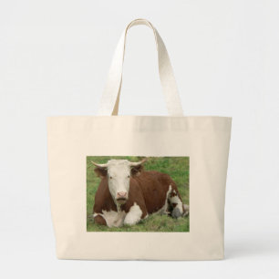 Vache dans le Sac fourre-tout de l'herbe