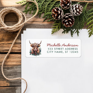 Vache de Noël Highland avec chapeau de Père Noël A